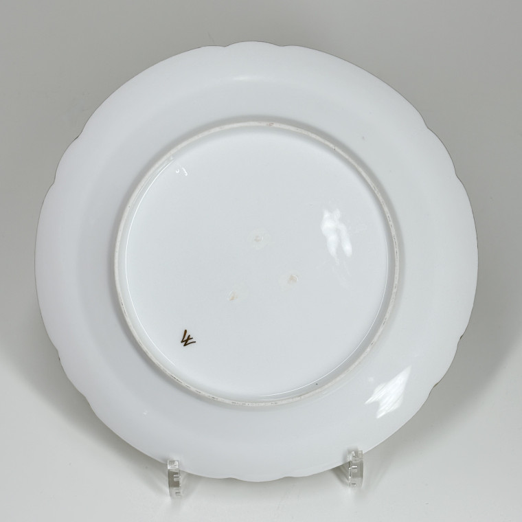 Suite de neuf assiettes en porcelaine de Bordeaux et deux sucriers - XVIIIe siècle