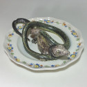Alcora earthenware plate decorated in trompe-l'oeil - Eighteenth century