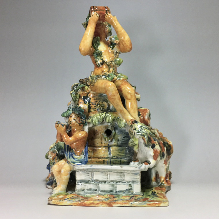 Fountain depicting Bacchus in majolica from Urbino, Patanazzi workshop circa 1580.
