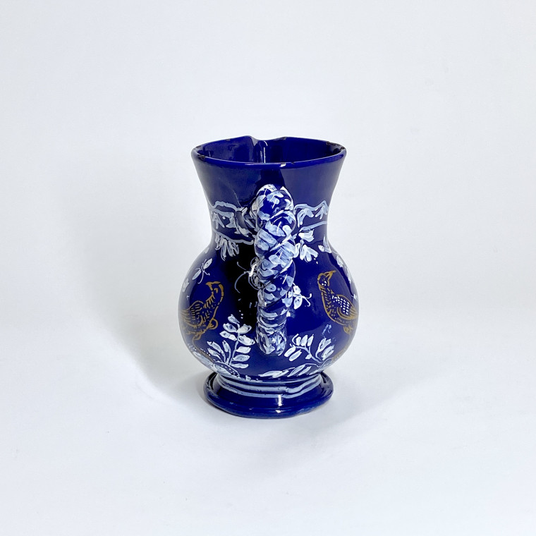 Nevers. Small earthenware pitcher with Persian blue background - Seventeenth century - Circa 1650