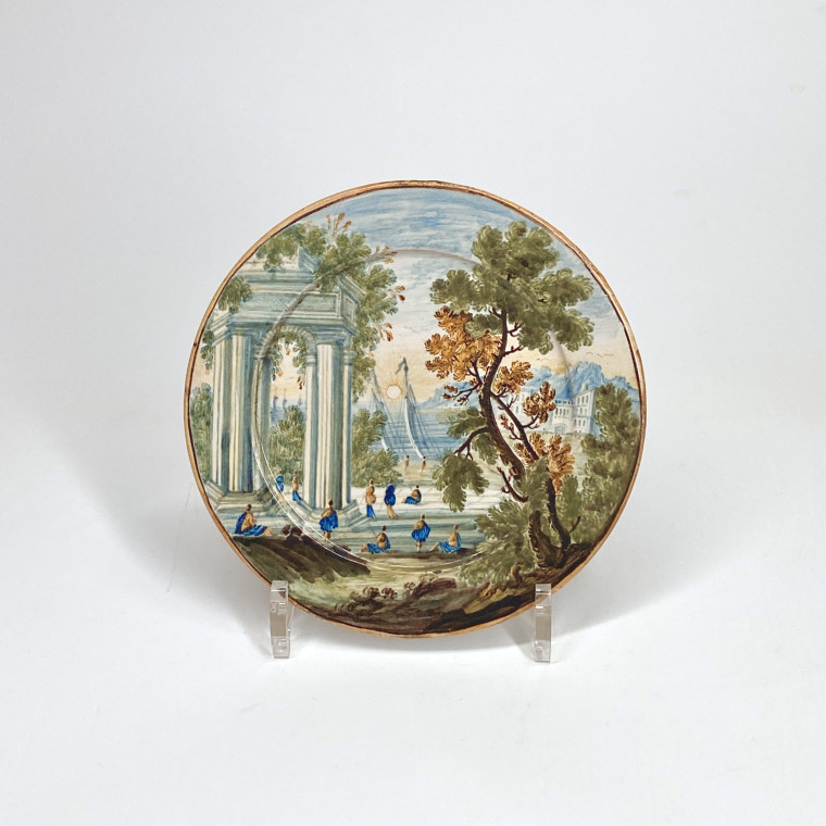Castelli - Petite assiette en faïence à décor d'un paysage - XVIIIe siècle