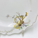 Marseille (Robert) Plate decorated with a viola and a hunting horn - Eighteenth century