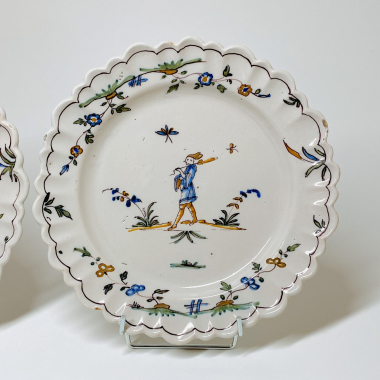 Pair of earthenware plates from Roanne - Eighteenth century