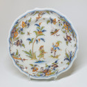 Assiette en faïence de Lyon à décor de grotesques - XVIIIe siècle
